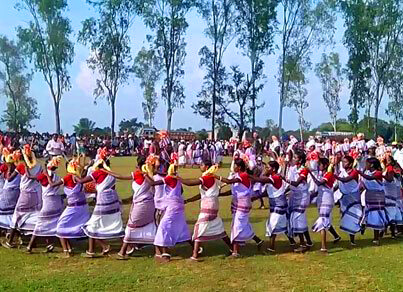 Karma Dance tribal performance with mandar drums around Karam tree